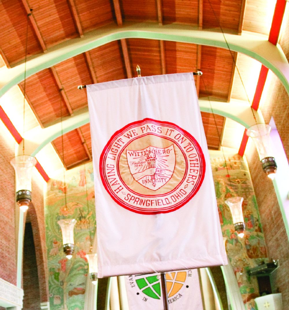 Pastor Installation having light banner in chapel