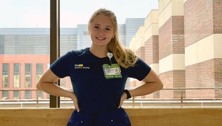 female student in nursing scrubs