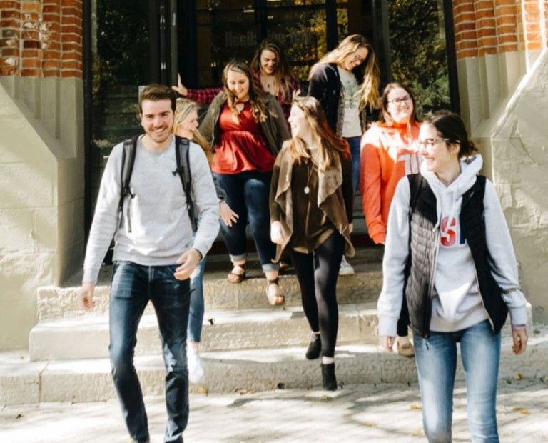 Students walking out of building