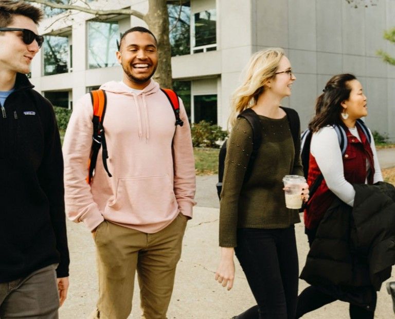 Laughing students on campus