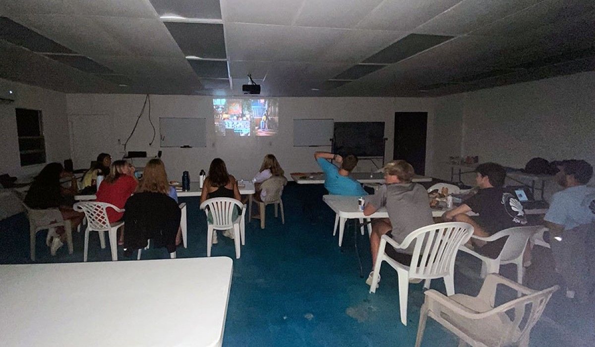 Students watching a movie in the classroom
